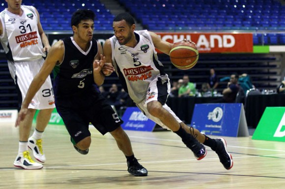 Napier mail. Photo: Photo: Anthony Au-Yeung / photosport.co.nz. Hawks' Everard Bartlett drives against Rangers' Shea Ili. 2013 National Basketball League, Super City Rangers v Hawkes Bay Hawks, Trust Stadium, Auckland. Sunday 19th May 2013. Photo: Anthony Au-Yeung / photosport.co.nz